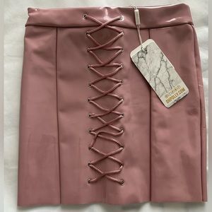 Oh Polly pink vinyl mini skirt US size 4. Never worn before.